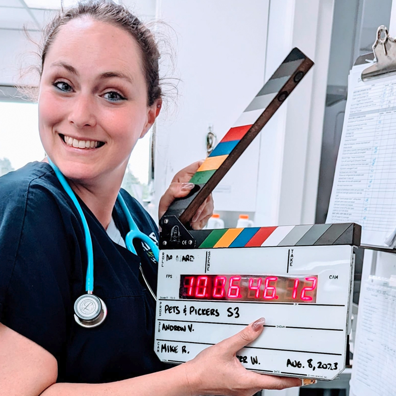 Veterinary professional filming Pets & Pickers at RAPS Animal Hospital